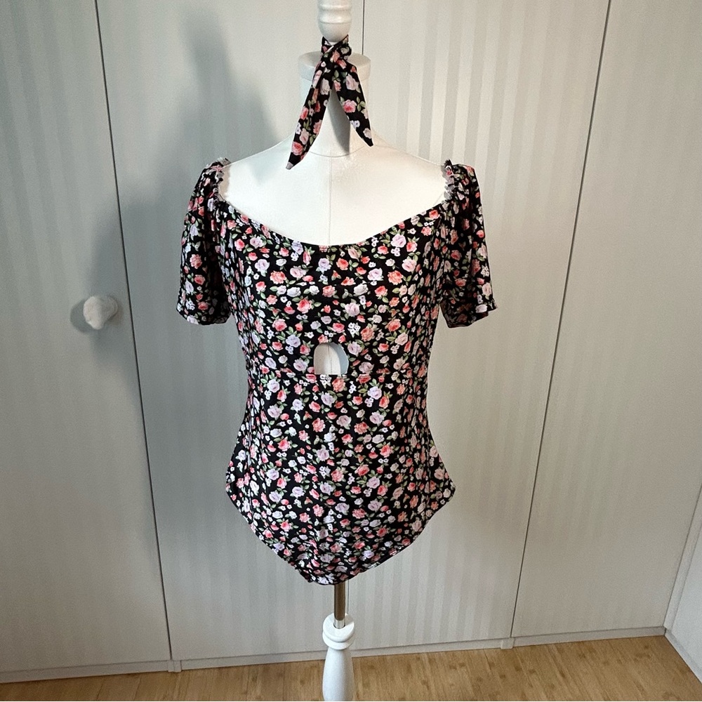 Black and floral one piece swim or bodysuit with matching hair tie Size 2X